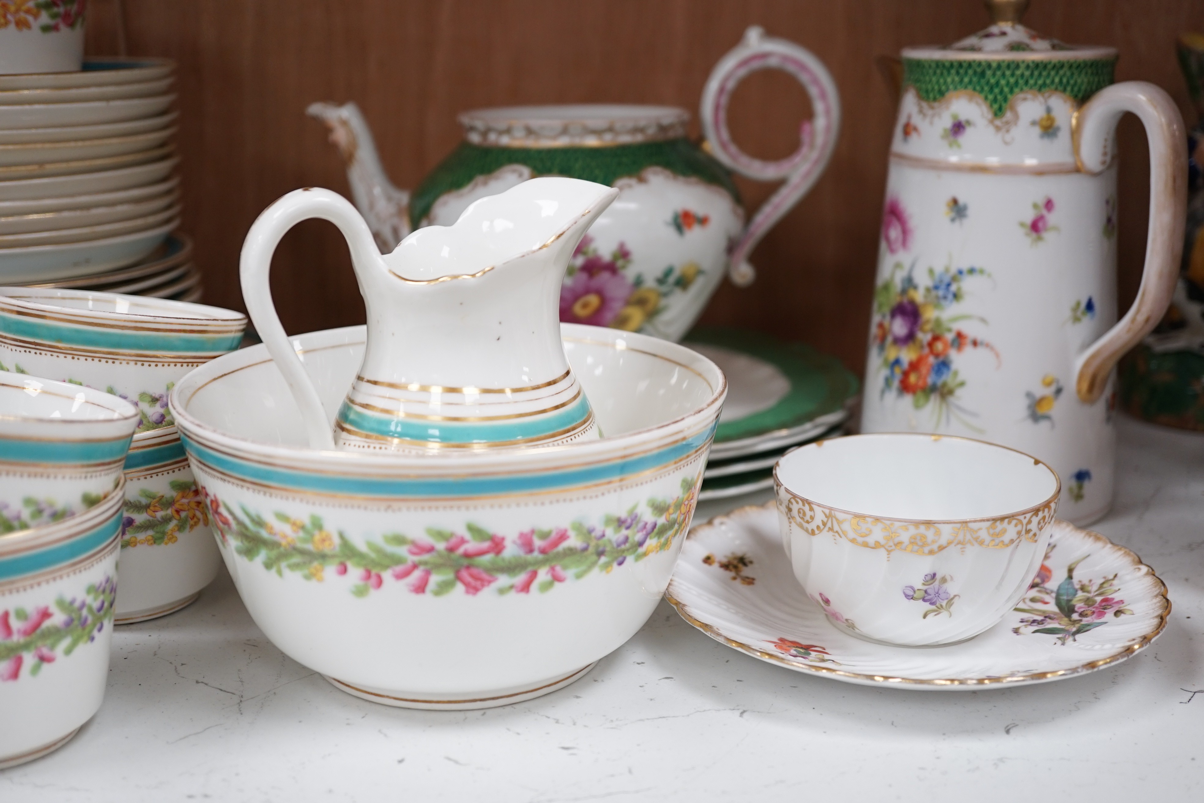 Mixed tea wares to include Nymphenburg, Dresden and a Victorian floral decorated bone china tea set